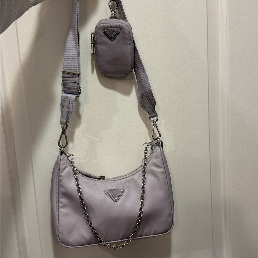 Prada Lavender 2005 Re-EditionShoulder Bag with Chain Accent and punch.